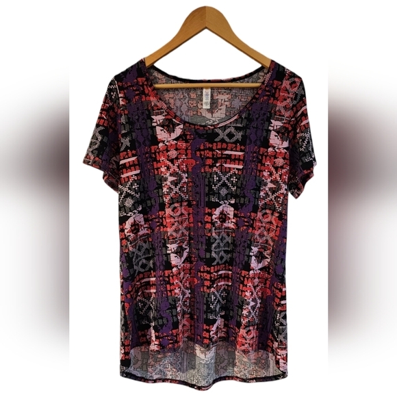 LuLaRoe Tops - LuLaRoe - Red and Purple Short Sleeve Graphic Tunic Longer In The Back To Cover‍